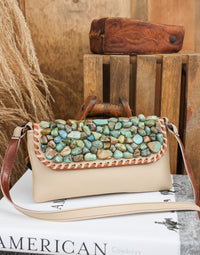 THE KURTMEN NAT PEBBLE CROSSBODY-SADDLE
