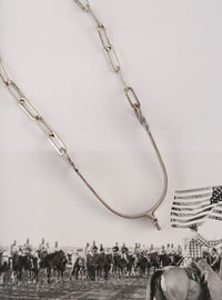 THE DUSTY NECKLACE
