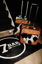 THE TRAVELING COWBOY SUITCASE