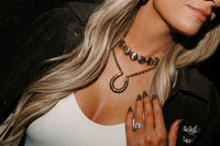 THE RAY TWISTED HORSESHOE NECKLACE