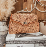 THE RAVEN TOOLED CROSS BODY CLUTCH